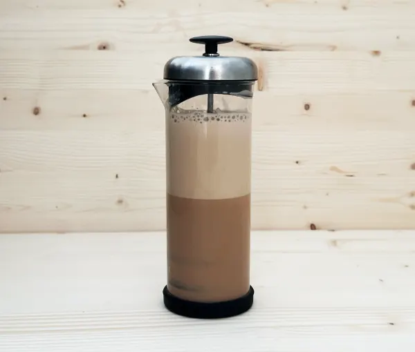 NooTea Brew 2 latte steeping in a milk frother press