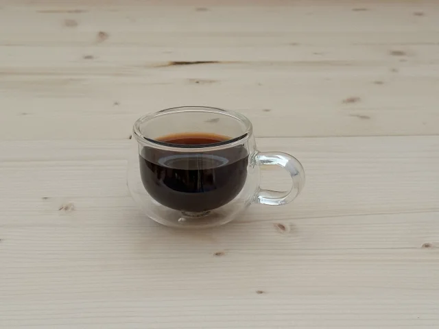 Glass cup of concentrated NooTea brewed espresso-style