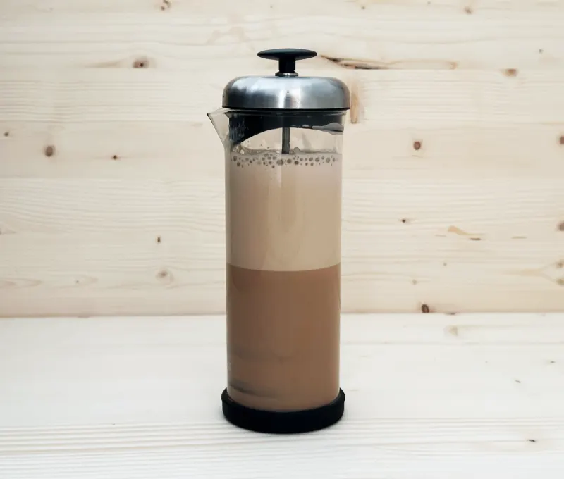 NooTea Brew 2 latte steeping in a milk frother press