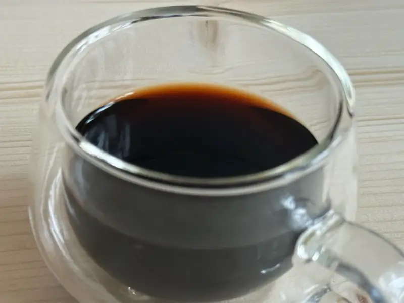 NooTea Brew 2 tea liquor in glass cup