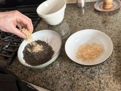 Hand-blending Lion's Mane into loose leaf tea