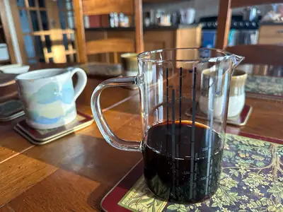 Brewed NooTea in a glass jug on the table