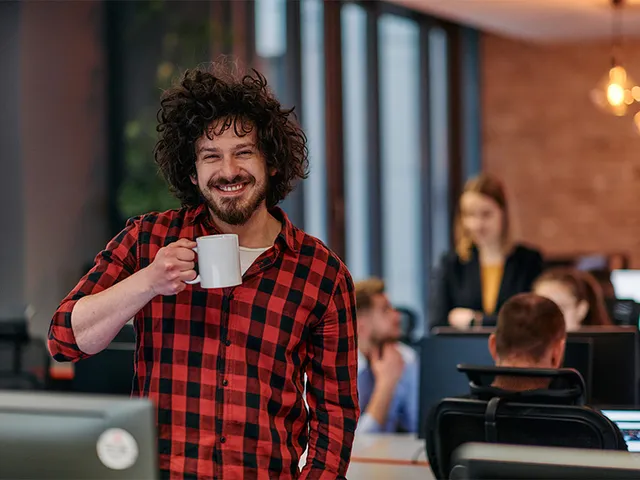 Office workspace with person enjoying focused work time with NooTea